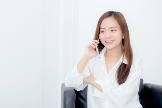 Beautiful of portrait young asian woman smiling sitting relax on the chair, girl using mobile smart phone talking enjoy, communication and social network concept.