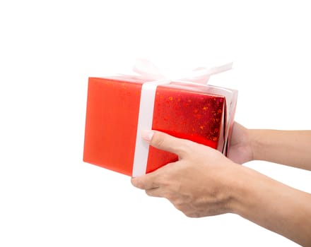 Red gift box white ribbon holding hand isolated on white background, using for christmas and new year or holiday other.