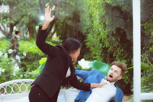 Business people argue in meeting and asian woman fighting man about mistake in work at office, businesswoman angry and blaming businessman with partner of bad, conflict concept