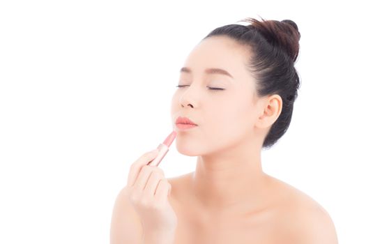 Beauty of portrait asian woman applying make up with lipstick of mouth isolated on white background, Beautiful girl on lips with happy, skincare and cosmetic concept.