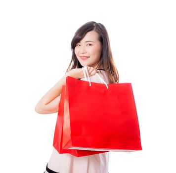 Beautiful of portrait young woman smiling holding paper bag isolated on white background, girl is customer or buyer, shopping concept.