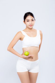 Portrait asian woman smiling holding green apple fruit and beautiful body diet with fit isolated on white background, girl weight slim with cellulite or calories, health and wellness concept.