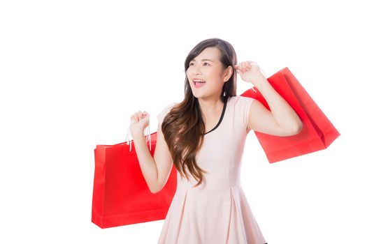 Beautiful of portrait young woman smiling holding paper bag isolated on white background, girl is customer or buyer, shopping concept.