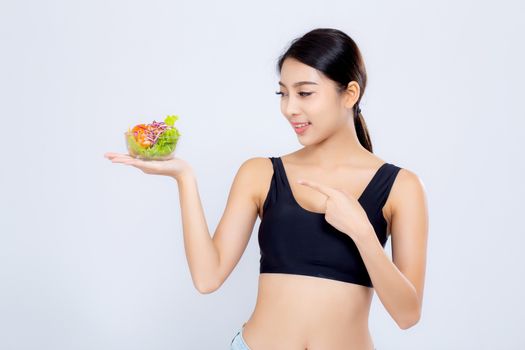 Beautiful portrait young asian woman smiling holding salad vegetable food isolated on white background, girl diet eating vegetarian for healthy, health care or wellness concept.