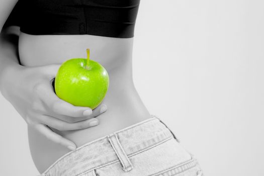 Beautiful body woman sexy slim holding green apple with cellulite for wellness, girl with fitness for weight loss and healthy isolated on white background, gray tone, healthcare and diet concept.