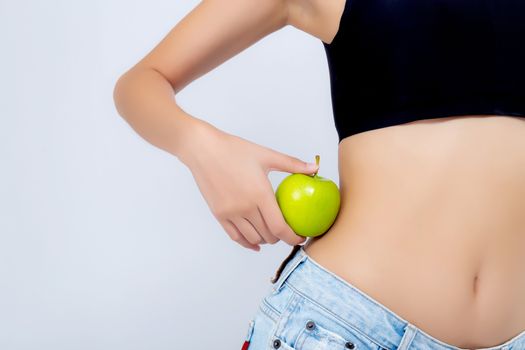 Beautiful body woman sexy slim holding green apple with cellulite for wellness, girl with fitness for weight loss and healthy isolated on white background, healthcare and diet concept.