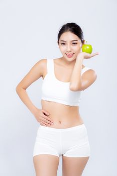 Portrait asian woman smiling holding green apple fruit and beautiful body diet with fit isolated on white background, girl weight slim with cellulite or calories, health and wellness concept.