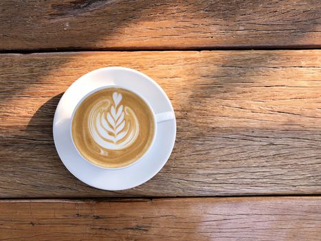 Coffee cup latte art in morning