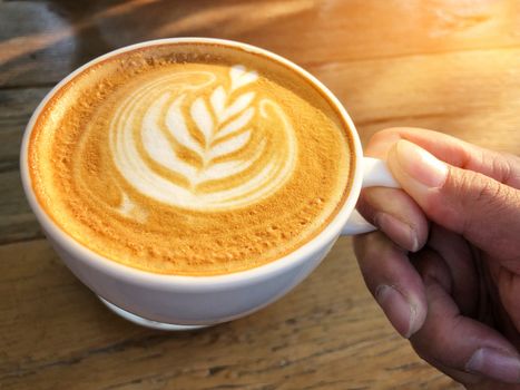 Coffee cup latte art in morning