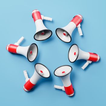 Red and White Bullhorn Megaphones Arranged in a Circle on Blue Background with Copy Space 3D Illustration