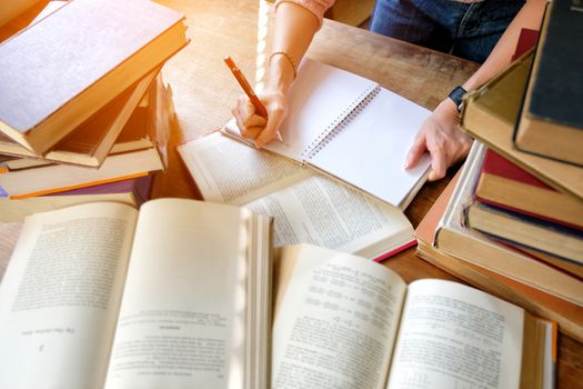 Young woman studying in library