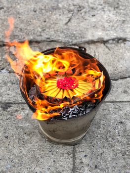 Heaven Chinese banknotes and gold paper burning in Moon Festival