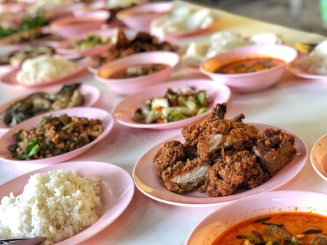 Esan Thai food fried chicken, papaya salad, Spicy minced pork