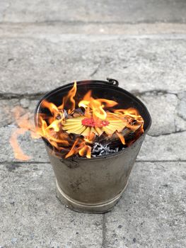 Heaven Chinese banknotes and gold paper burning in Moon Festival