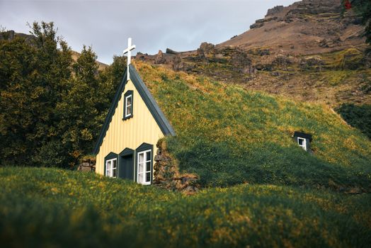 Historic turf Church Hofskirkja in the small icelandic village of Hof, Iceland