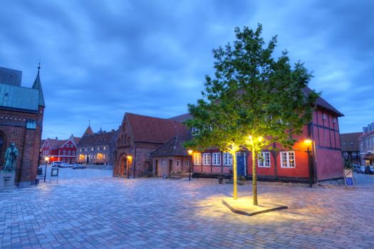 Street and houses in medieval Ribe town by night, Denmark - HDR