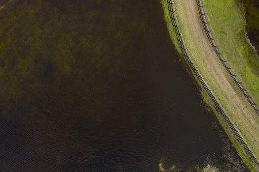 Aerial photograph of a horse trotting track near a fresh water lake in New South Wales in regional Australia