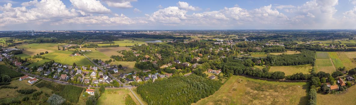 Aerial high angle of De Pinte aerea, agricultural village near Ghent, Belgium. Drone point of view.