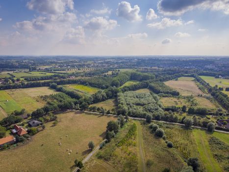 Aerial high angle of De Pinte aerea, agricultural village near Ghent, Belgium. Drone point of view.