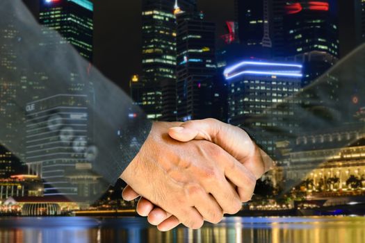 Business men and women shaking hands with each other to work together.