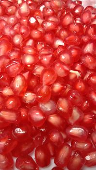 pomegranate seeds stock on plate for Guest