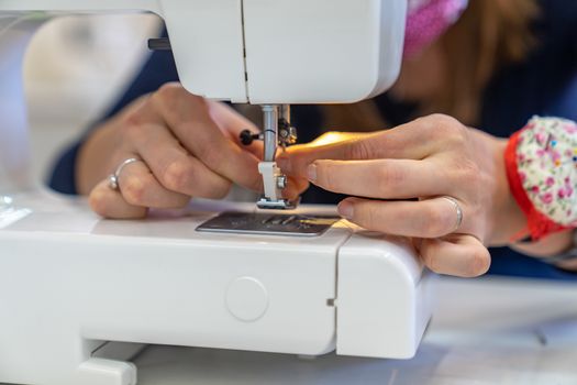 thread replacement in a sewing machine for stapling fabric.