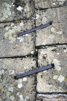 background iron clips on the joint of stone blocks