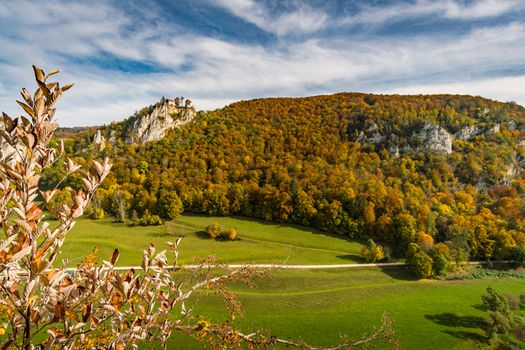 Colorful view of Bronnen Castle on the hiking trail in autumn in the Danube Valley near Beuron in the Sigmaringen district