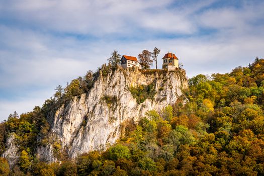 Colorful view of Bronnen Castle on the hiking trail in autumn in the Danube Valley near Beuron in the Sigmaringen district