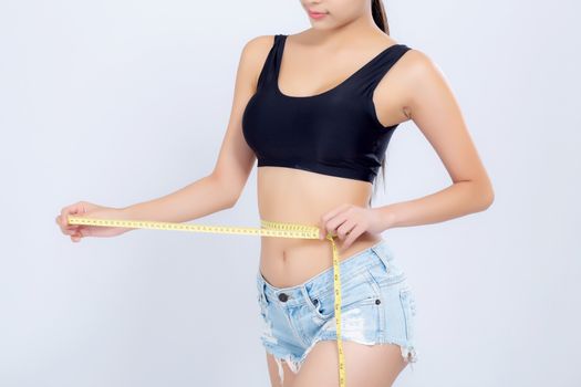 Closeup asian woman diet and slim with measuring waist for weight isolated on white background, girl have cellulite and calories loss with tape measure, health and wellness concept.