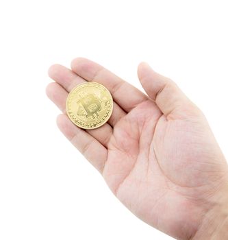 Closeup hand holding gold bitcoin isolated on white background, Digital currency money trading with cryptocurrency, coin with profit, finance concept.