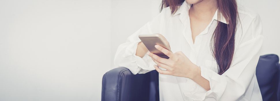 Banner website young asian woman smiling sitting relax on the chair, girl using mobile smart phone talking enjoy, communication and social network concept.