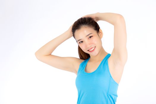 Beautiful portrait young asian woman standing stretch muscle arm isolated on white background, girl wear sport clothes exercise and yoga for health, wellness concept.