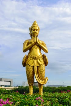 Kinnaree golden statue along the freeway.