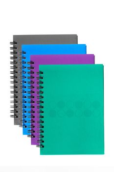 Colorful note book isolated on white background.