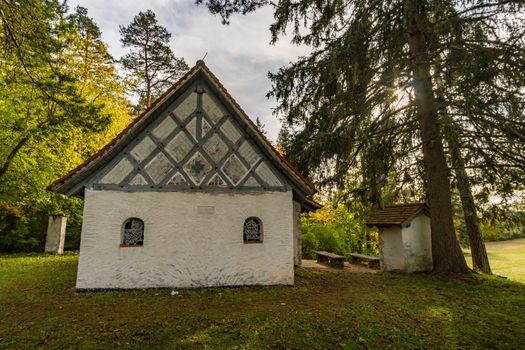 Trinity Chapel on the hiking trail in the Danube Valley in colorful autumn near Beuron in the Sigmaringen district