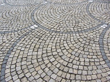Old stone pavement in perspective. High quality photo. Circle paving. Germany, Munich, Konigsplatz