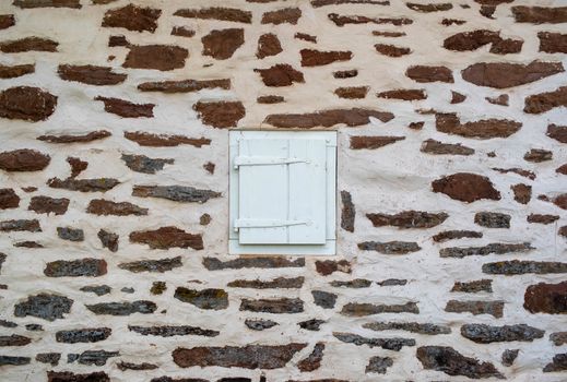 Beautiful colonial Pennsylvania construction, antique hinges and rough textured stone wall.