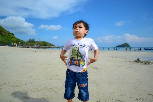 Rayong,Thailand,May5th,2014:The boys are happy and fun to see the ocean for the first time.