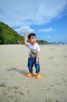 Rayong,Thailand,May5th,2014:The boys are happy and fun to see the ocean for the first time.