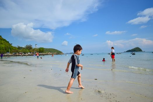 Rayong,Thailand,May5th,2014:The boys are happy and fun to see the ocean for the first time.