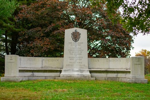 The Massachusetts Monument With an Autumn Tree Behind It at Valley Forge National Historical Park