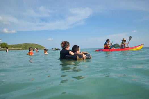 Rayong,Thailand,May5th,2014:The boys are happy and fun to see the ocean for the first time.