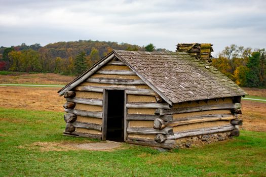 A Reconstructed Log Hut in a Wide Open Field in Valley Forge National Historical Park