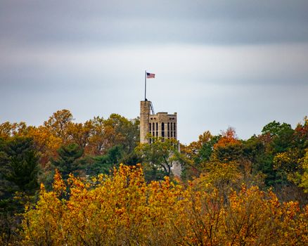 The Tower of the Washington Memorial Chapel at the Valley Forge National Historical Park Over Autumn Trees