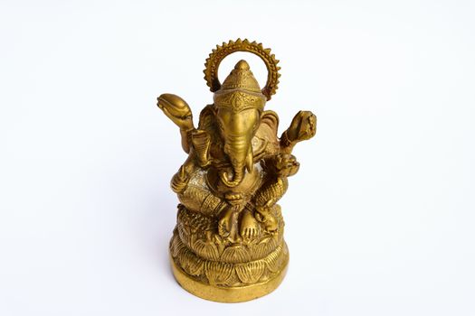 an elephant-headed deity, son of Shiva and Parvati. Worshiped as the remover of obstacles and patron of learning, he is usually depicted colored red, with a potbelly and one broken tusk, riding a rat.