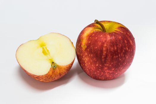 Red apple with white background.