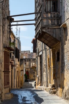 Narrow alley / lane in the old town of Rhodes city on Rhodes island, Greece