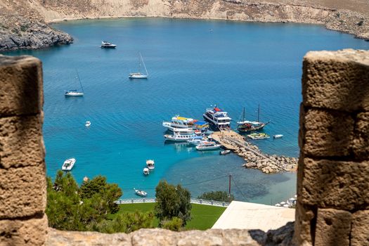 View on a beautiful bay from the acropolis of Lindos on rhodes island in greece