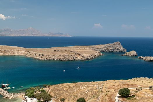 View on a beautiful bay from the acropolis of Lindos on rhodes island in greece